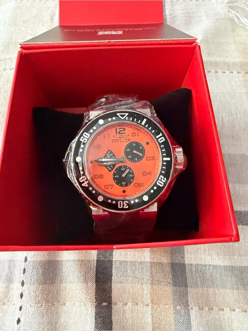 Invicta Orange Dial Watch with Black Bezel and Subdials